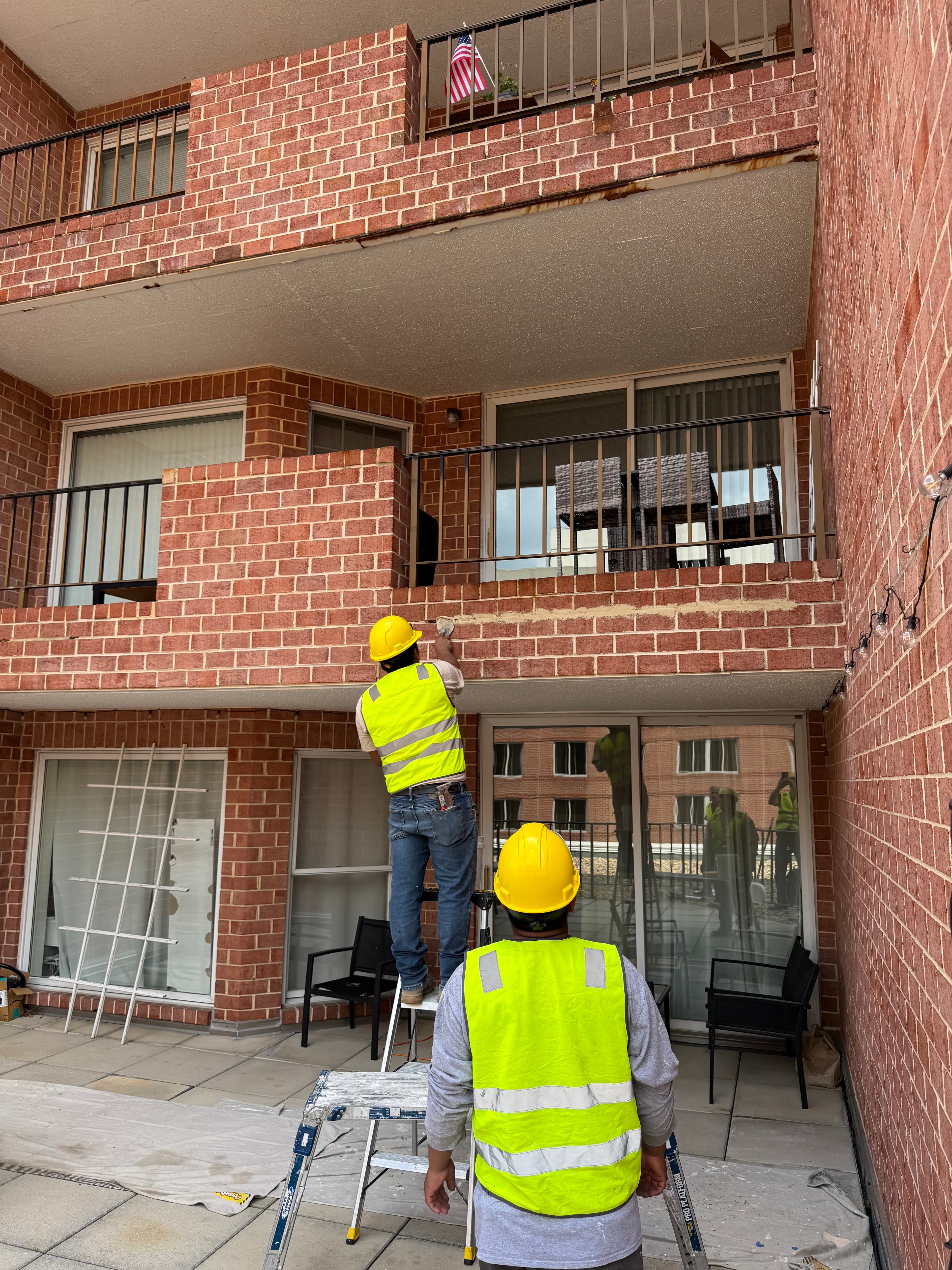 Commercial apartment building brick and balcony inspection in DC by Atlantic Construction