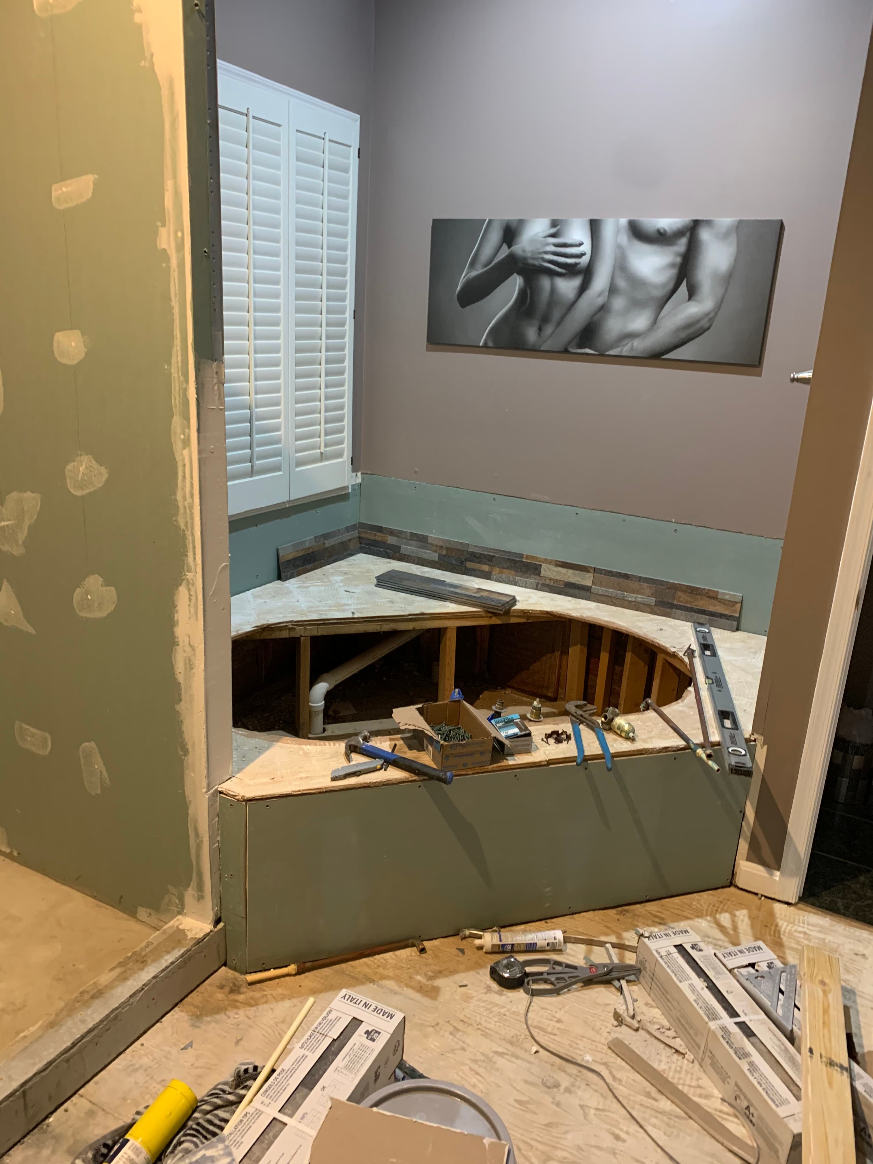 Bathroom tub and shower custom stone platform installation in Maryland by Atlantic Construction