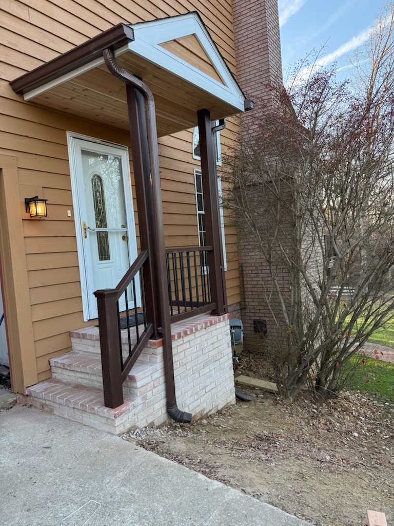 Custom brick and stone masonry front entry porch in Maryland by Atlantic Construction