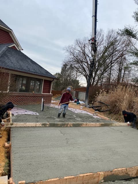 Residential concrete driveway pour and finishing in Maryland by Atlantic Construction