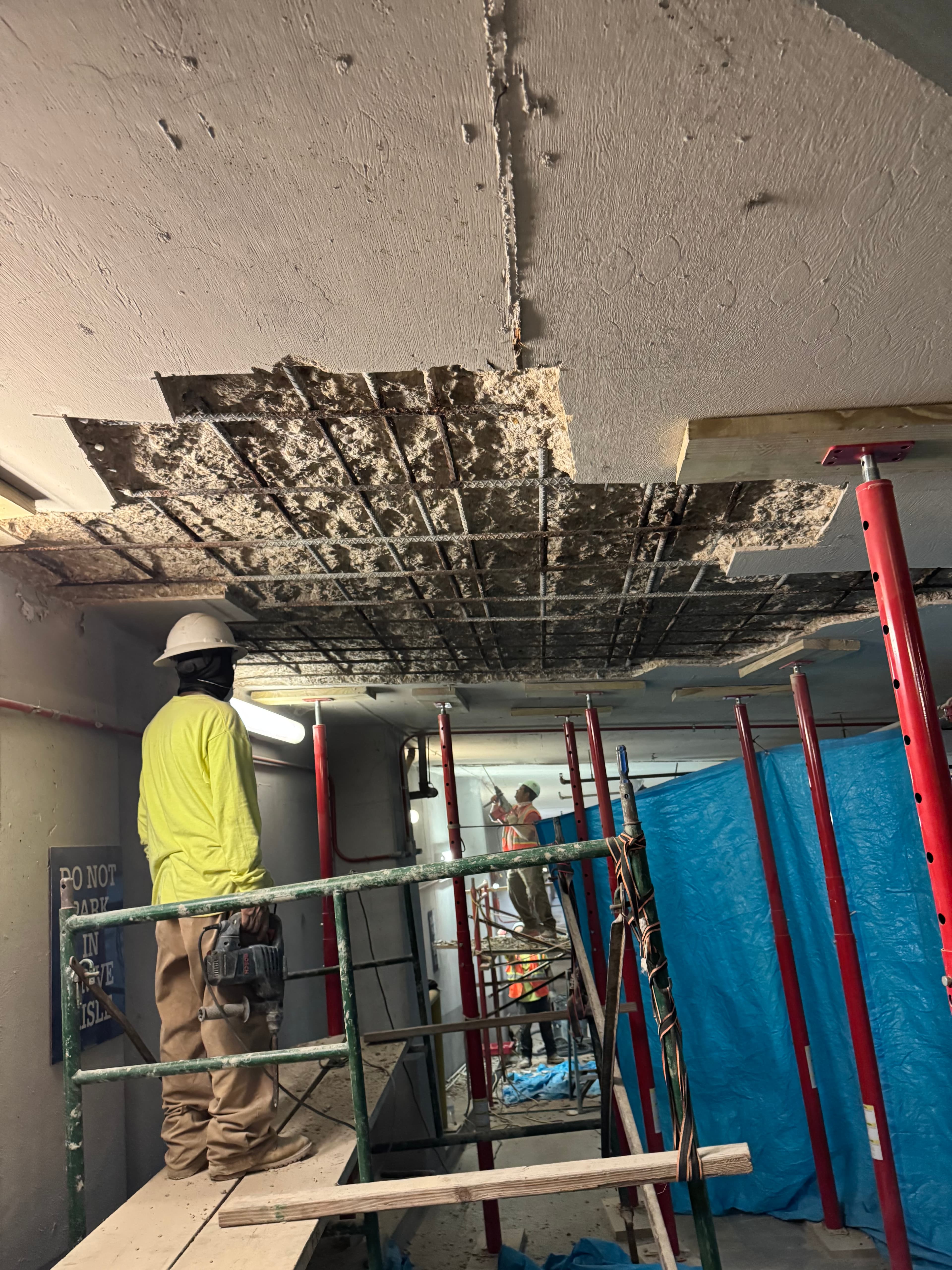 Commercial parking garage ceiling water damage repair in DC by Atlantic Construction
